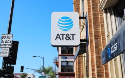 AT&T posts subscriber beat, but stock falls as company takes a big charge